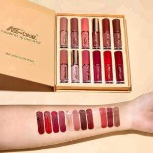 All twelve AS~ONE liquid lipstick shades swatched on skin beside the open gift box